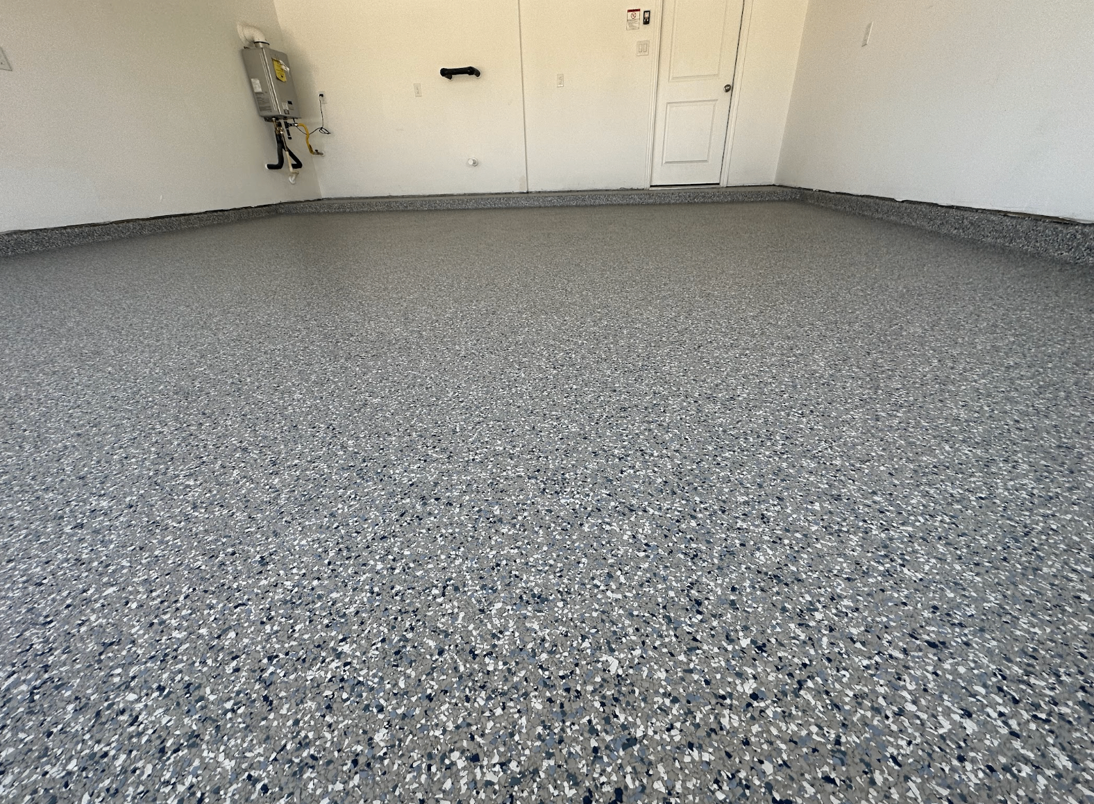 Gray, white and blue flake epoxy garage floor